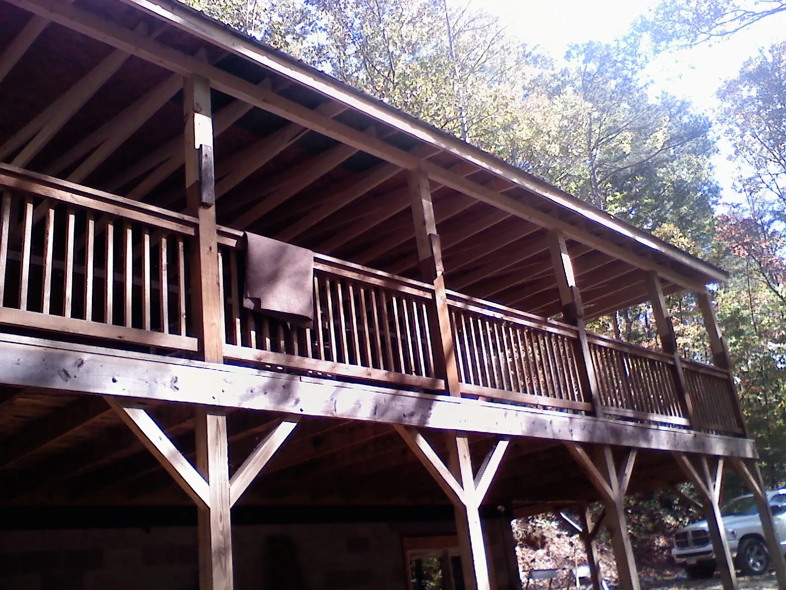 Timber framing under a new elevated porch and deck — Roof Leak Repair in Ferdinand by Roofing Brothers